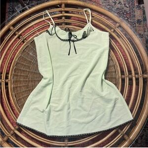 Elegant Mint Green Women's Top with Black Trim
